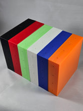 Load image into Gallery viewer, Six modular organizer components in black, red, green, white, blue, and orange are arranged side by side on a white background. The 3D-printed blocks showcase a range of color options and feature small side mounting holes, highlighting the customizable and stackable design of the modular organizer system.