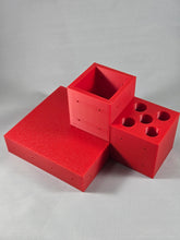 Load image into Gallery viewer, Red modular desk organizer components arranged together on a light background. The 3D-printed set includes a large tray, an open storage cup, and a five-hole pen holder, showcasing the customizable design and multiple storage options available within the modular organizer system.